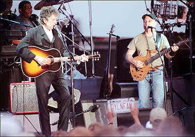 Bob Dylan and Paul Simon on stage