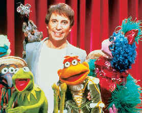 Paul Simon with Kermit and other Muppets