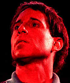 red faced Paul Simon