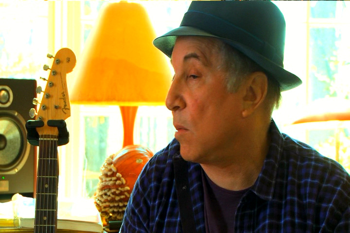Paul Simon can't remember what very important questions he wanted to ask God