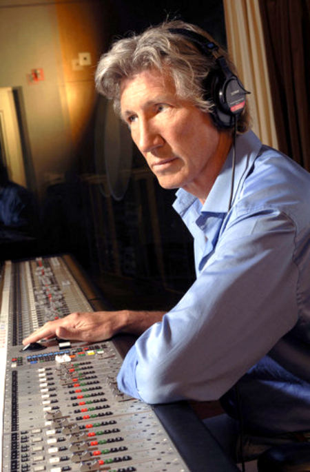 Roger Waters at a recording studio control board