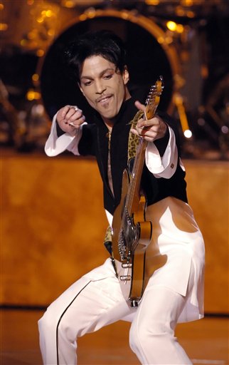 Prince Rogers Nelson playing guitar