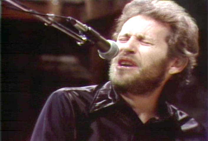 Levon Helm on the mic - 1976 Saturday Night Live image