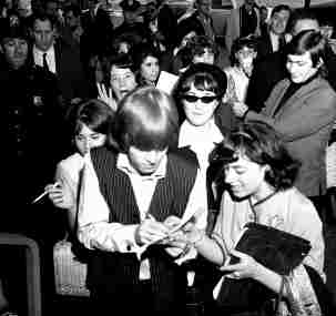 Brian Jones signing autographs