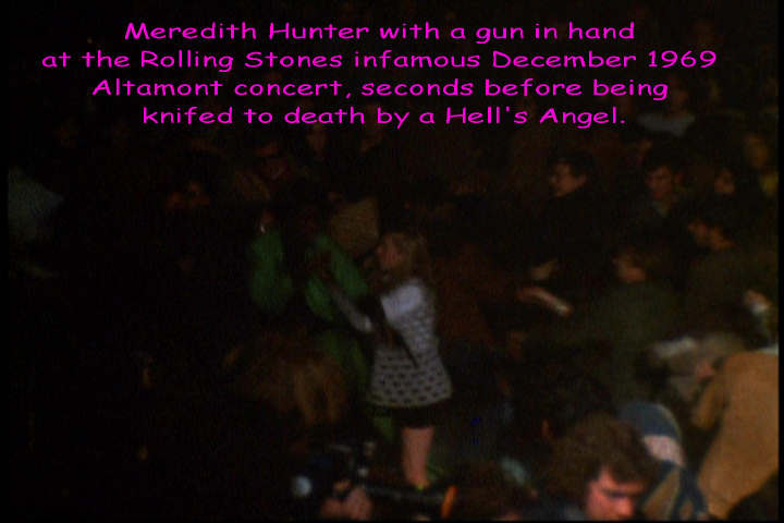 Meredith Hunter with gun in hand just before being knifed by Alan Passaro at Altamont, 1969