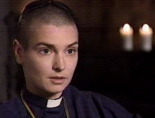 Sinead O'Connor looks cute in her priest collar