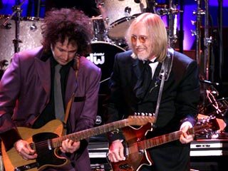 Tom Petty and Mike Campbell on stage