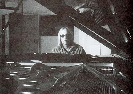 Tom Petty playing piano