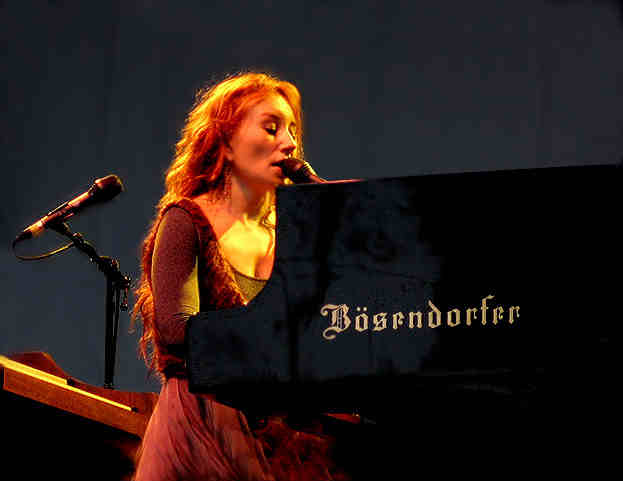 Tori Amos playing piano onstage, 2005 photo