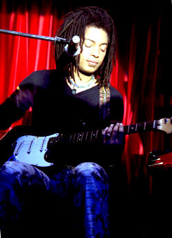 Terence Trent D'Arby playing guitar