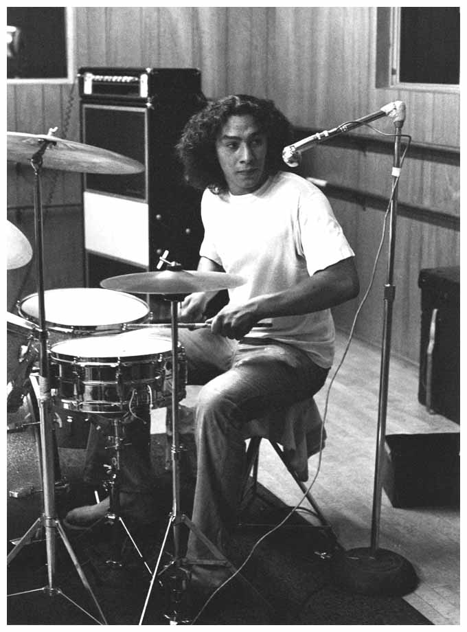 young Alex Van Halen playing drums