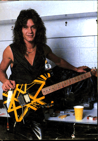 Eddie Van Halen holding a guitar