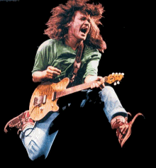 Eddie Van Halen - He flies through the air with the greatest of ease