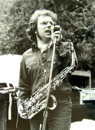 Van Morrison on stage with a saxophone