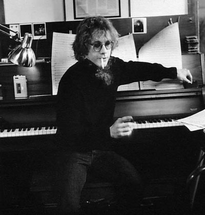 Warren Zevon smoking at the piano