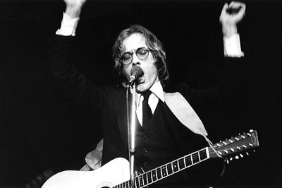 Warren Zevon playing 12 string guitar