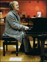 Warren Zevon playing piano