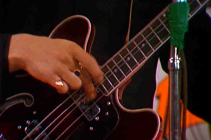 John Entwistle playing bass closeup