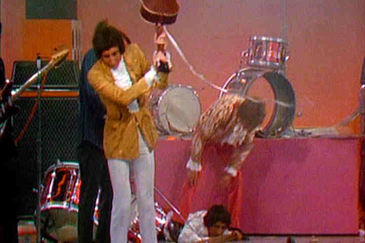 Pete Townshend smashing Tommy Smothers' guitar