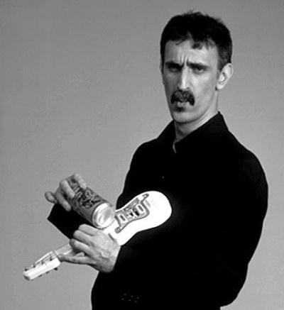 Frank Zappa plays tiny slide guitar