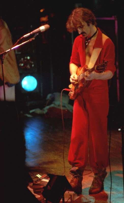 Frank Zappa looks devilish in his red suit