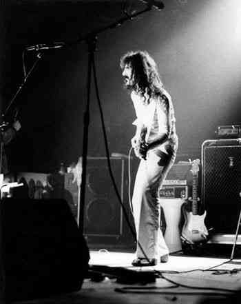 black and white photo of Frank Zappa on stage