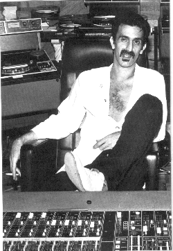 Frank Zappa works on his studio tan