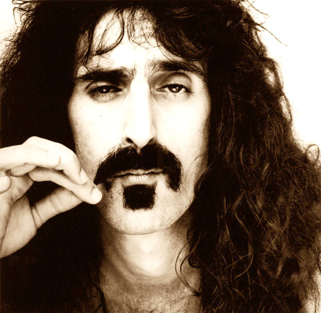 Frank Zappa twists his evil moustache