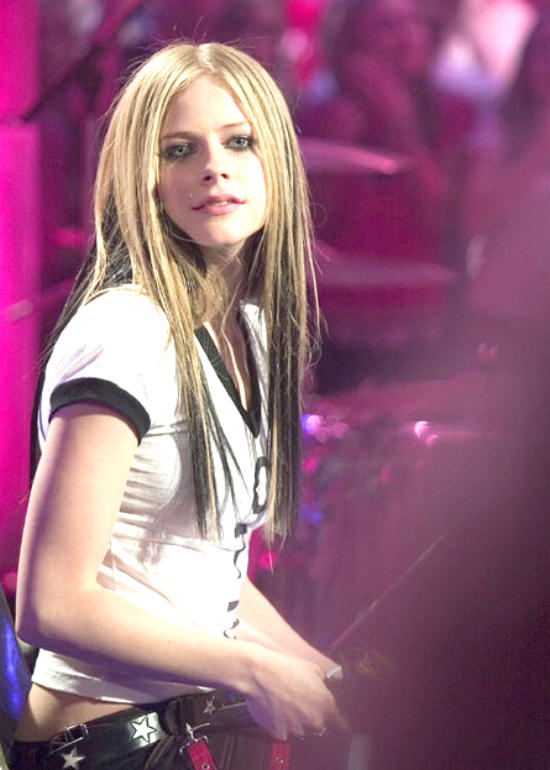 Avril Lavigne looking into the camera