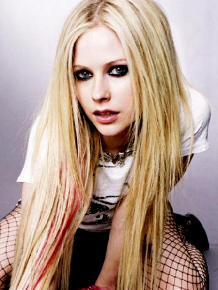 Avril Lavigne crawling on her hands and knees