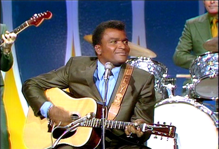 smiling Charley Pride