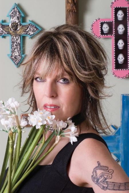 tough but girly Lucinda Williams