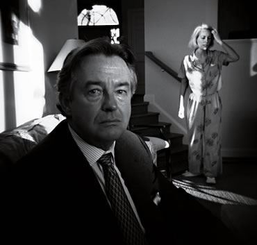 cheesy dramatic black and white picture of Joe Wilson and Valerie Plame